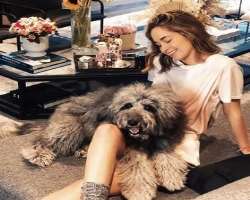 Matos has adopted a huge furry dog in her home and often plays with him when she is at her home.